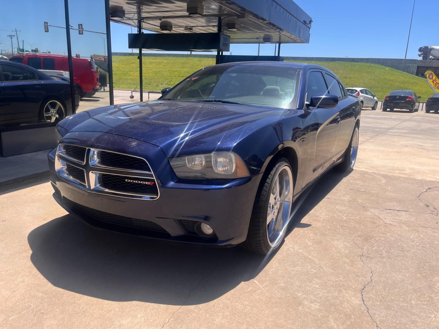 2014 BLACK DODGE CHARGER SE SE (2C3CDXBG0EH) with an 3.6L V6 DOHC 24V engine, 5-Speed Automatic transmission, located at 8101 E. Skelly Dr., Tulsa, OK, 74129, (918) 592-3593, 36.121891, -95.888802 - Photo#0